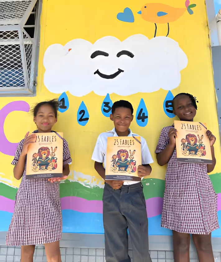 Children with fable books in a classroom